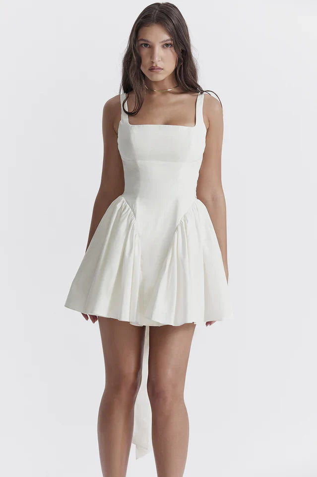 Ronda | Mini Dress with Pleated Skirt and Back Bow